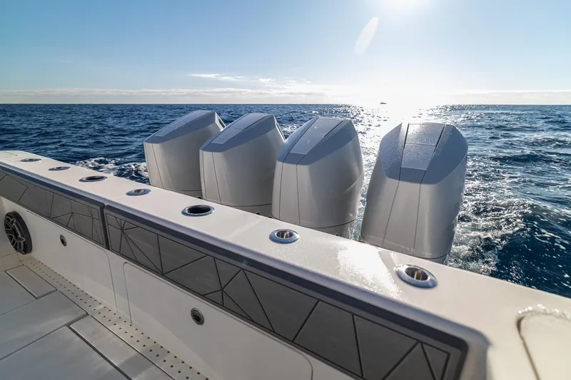 Slide: The Image of 2026 SeaVee 420Z fishing boat with rods and powerful engines on open water. - 39