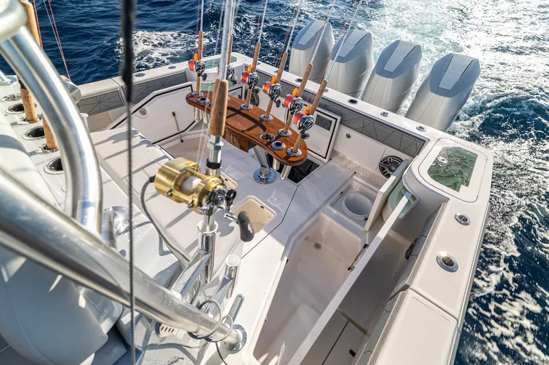 Slide: The Image of 2026 SeaVee 420Z fishing boat with multiple rods and powerful engines on open water. - 40