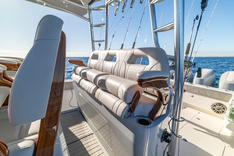 Slide: The Image of 2026 SeaVee 420Z boat interior with luxurious seating and ocean backdrop. - 51