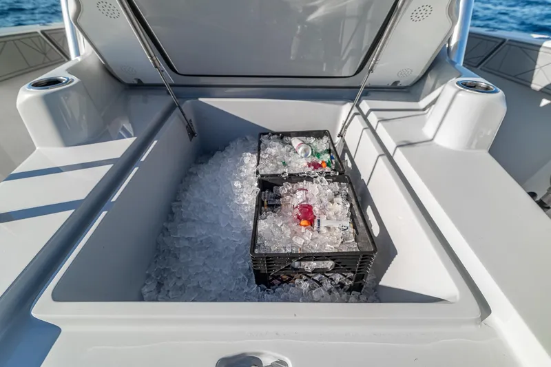 Slide: The Image of Open cooler with drinks and ice on 2026 SeaVee 420Z boat deck. - 53