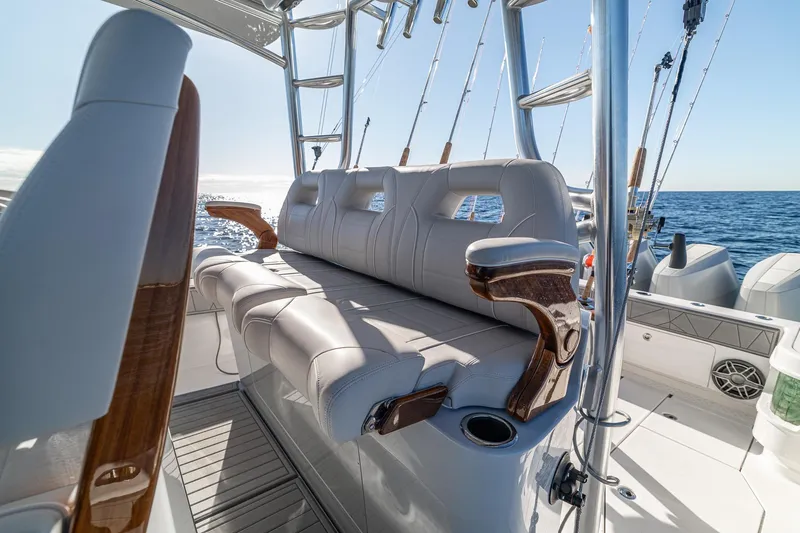 Slide: The Image of Luxurious seating on 2026 SeaVee 420Z boat, featuring elegant design and ocean backdrop. - 72