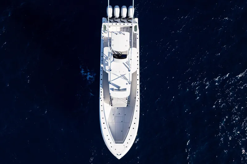 Slide: The Image of 2026 SeaVee 420Z boat with custom "WarBux" design on open water. - 8