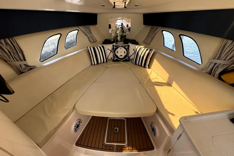 Slide: The Image of Luxurious interior of 2014 Intrepid 400 Cuddy boat with elegant seating and decor. - 20
