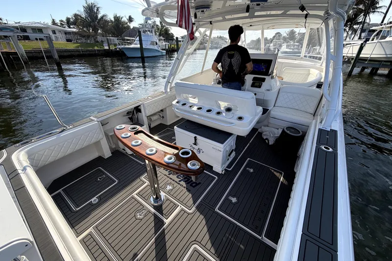 Slide: The Image of 2014 Intrepid 400 Cuddy cruising on clear blue waters under a sunny sky. - 3