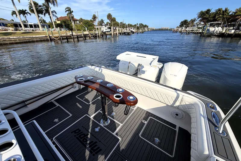 Slide: The Image of 2014 Intrepid 400 Cuddy cruising on open water, aerial view. - 6