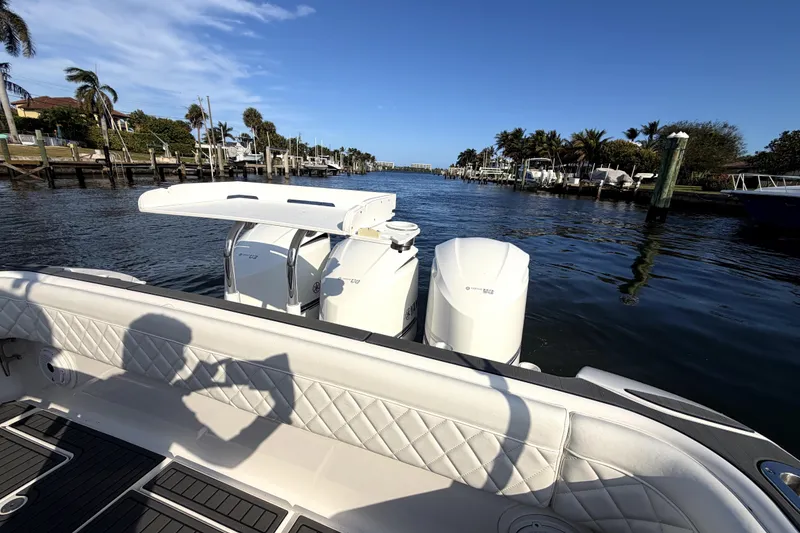 Slide: The Image of 2014 Intrepid 400 Cuddy boat on calm water, aerial view. - 8
