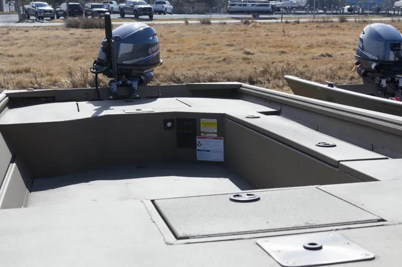 Slide: The Image of 2026 G3 Gator Tough 16 DK boat with Yamaha outboard motor in a grassy area. - 5