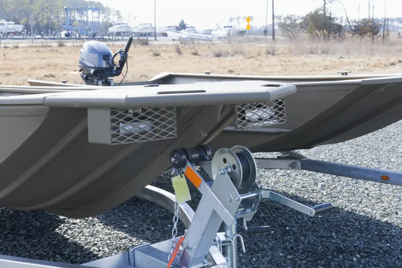 Slide: The Image of 2026 G3 Gator Tough 16 DK boat on trailer, featuring durable construction. - 9