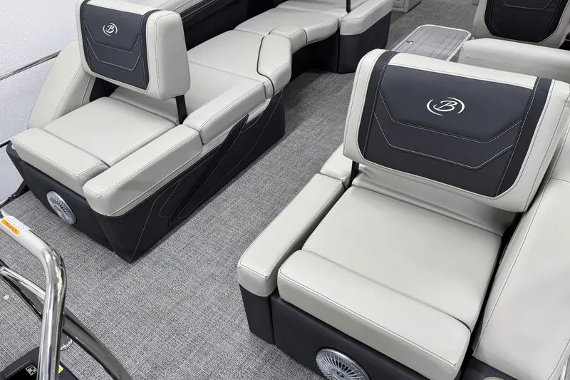Slide: The Image of 2026 Barletta Cabrio 24M boat interior with luxurious seating and modern design. - 12
