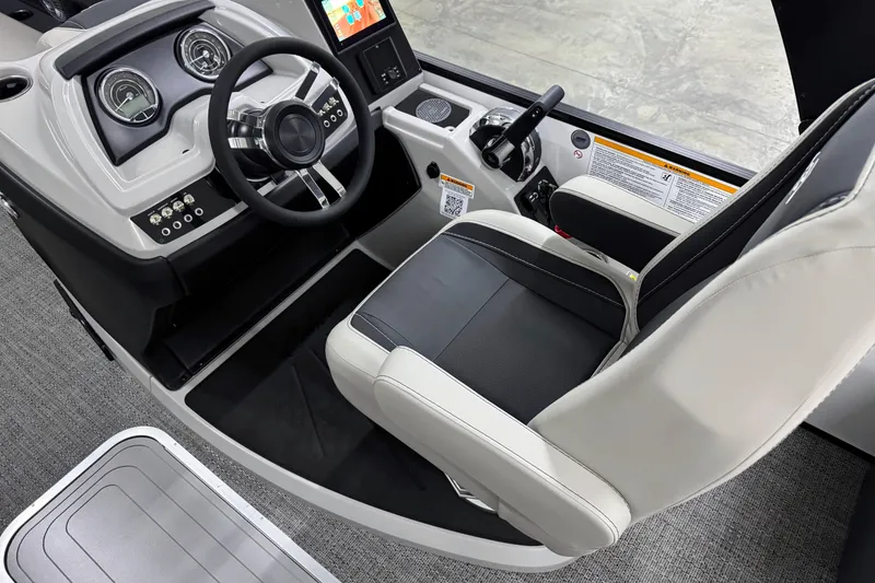 Slide: The Image of 2026 Barletta Cabrio 24M helm with modern controls and comfortable seating. - 24
