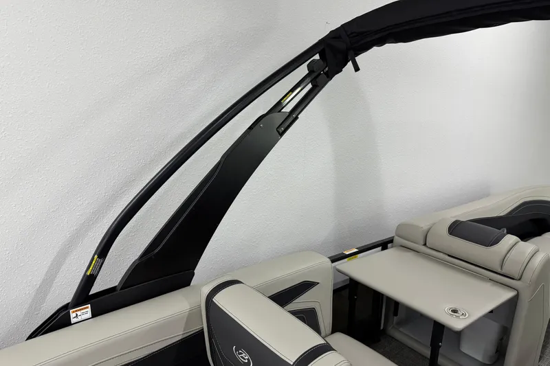 Slide: The Image of 2026 Barletta Cabrio 24M boat interior with sleek seating and modern design. - 40