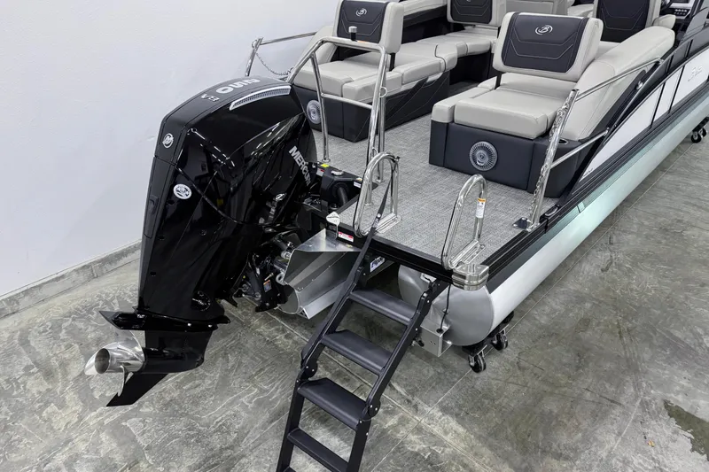 Slide: The Image of 2026 Barletta Cabrio 24M pontoon boat with Mercury outboard motor and spacious seating. - 9