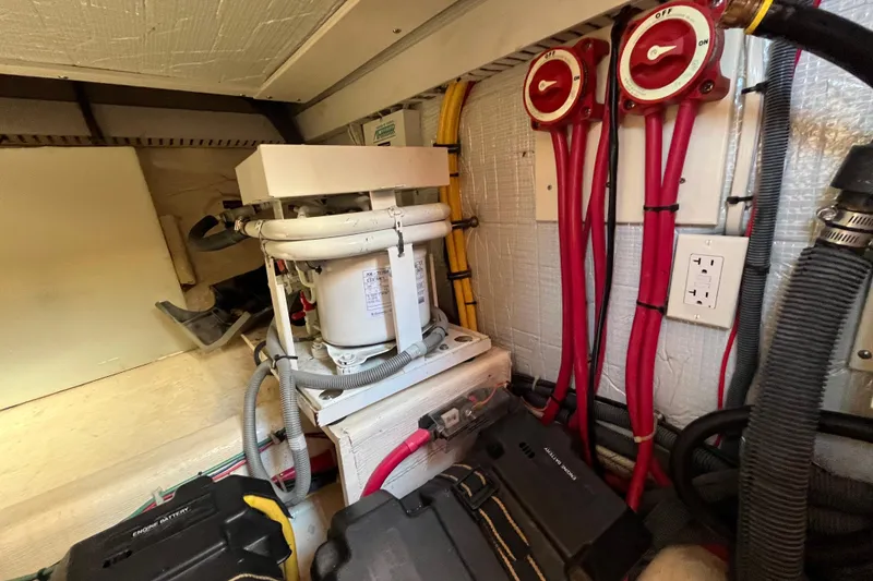 Slide: The Image of Engine room of 2006 Sabre 36 Flybridge Sedan with electrical components and wiring. - 39