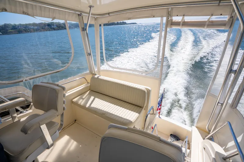 Slide: The Image of Interior view of 2006 Sabreline 36 Fly yacht cruising on open water. - 52