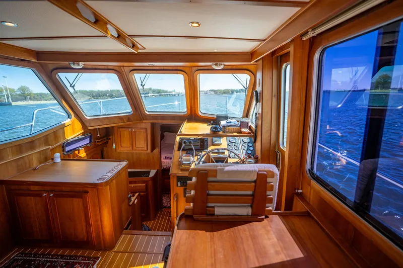 Slide: The Image of Interior of 2006 Sabreline 36 Fly yacht with wooden finish and panoramic windows. - 75