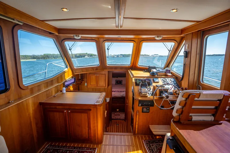 Slide: The Image of Interior of 2006 Sabreline 36 Fly yacht with wooden finish and panoramic windows. - 76