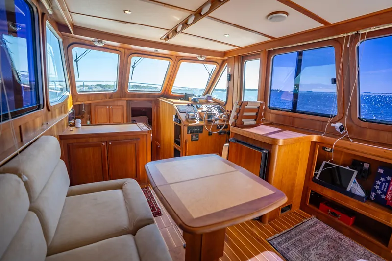 Slide: The Image of Luxurious interior of 2006 Sabreline 36 Fly yacht with wooden finishes and ocean view. - 80