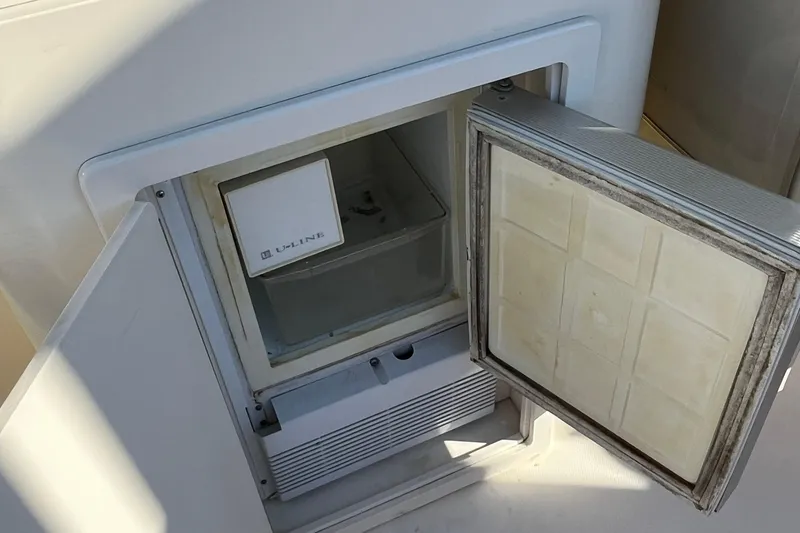 Slide: The Image of Open U-Line ice maker on 2006 Sabre 36 Flybridge Sedan yacht. - 16