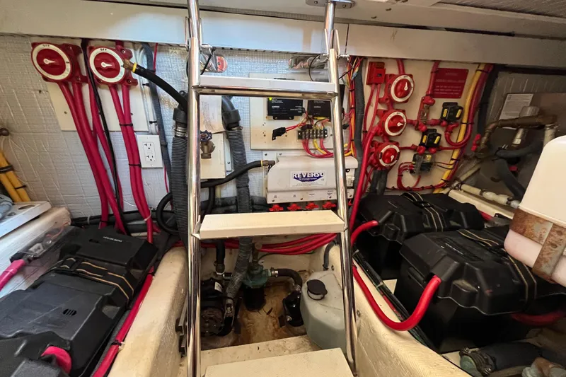 Slide: The Image of Engine room of 2006 Sabre 36 Flybridge Sedan with wiring and equipment. - 38