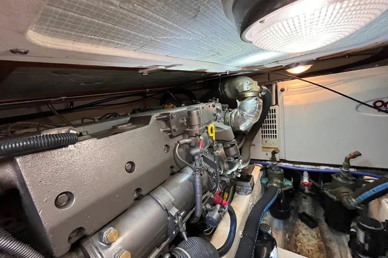 Slide: The Image of Engine room of 2006 Sabre 36 Flybridge Sedan, showcasing mechanical components and wiring. - 41