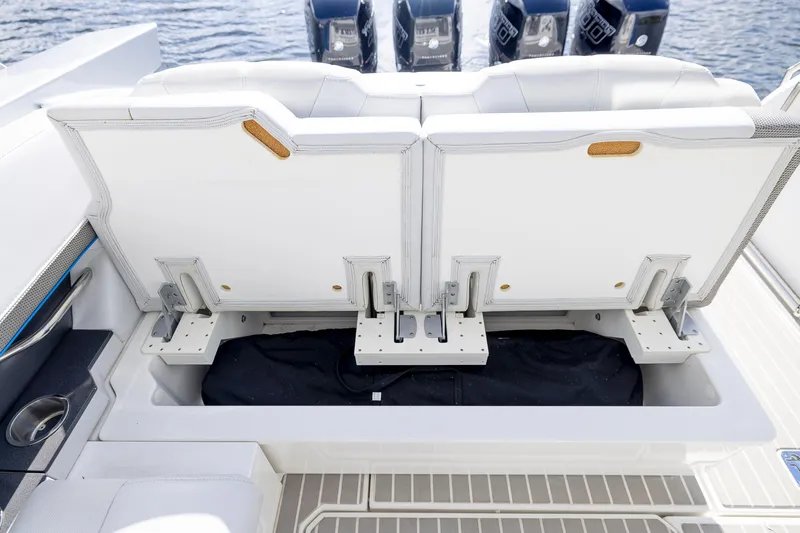 Slide: The Image of 2019 Formula 430 Super Sport Crossover boat seating with storage compartment. - 11