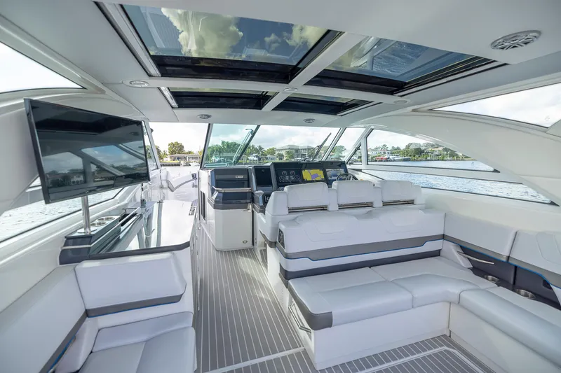 Slide: The Image of Luxurious interior of 2019 Formula 430 Super Sport Crossover yacht with modern seating and skylights. - 16
