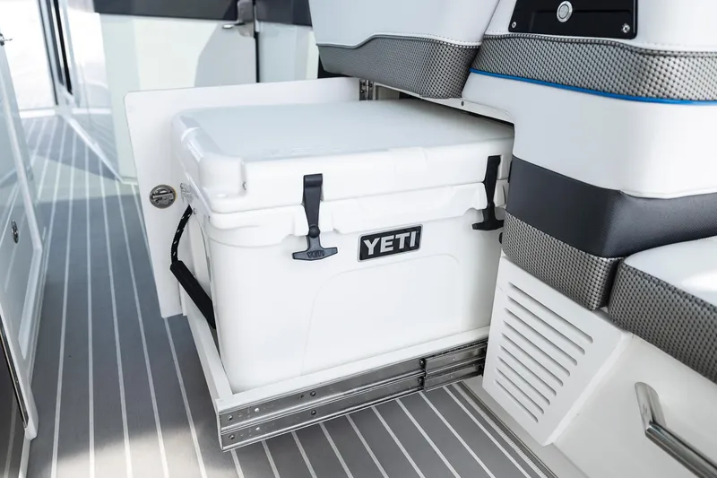 Slide: The Image of YETI cooler in 2019 Formula 430 Super Sport Crossover boat storage compartment. - 24