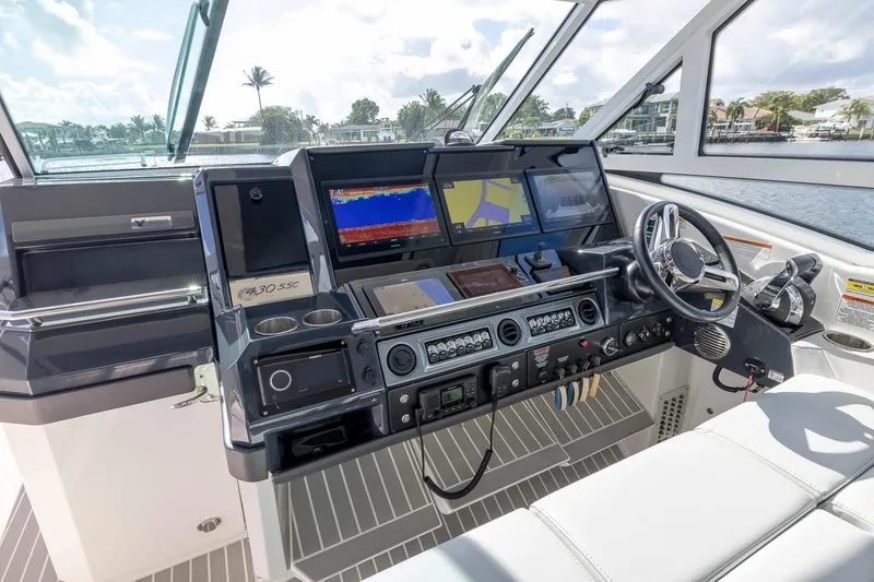 Slide: The Image of 2019 Formula 430 Super Sport Crossover helm with advanced navigation displays. - 31