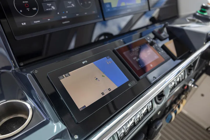 Slide: The Image of Dashboard of 2019 Formula 430 Super Sport Crossover with navigation screens and controls. - 34