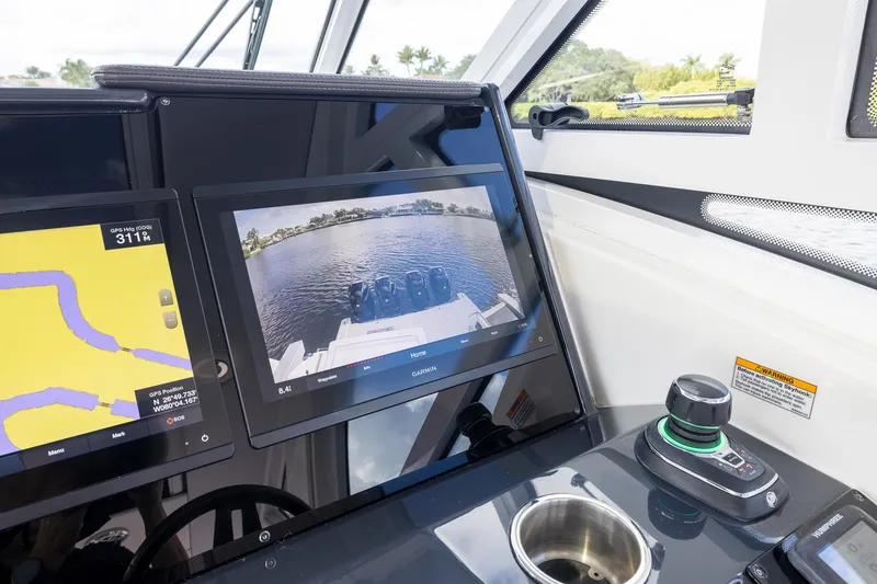 Slide: The Image of Dashboard of 2019 Formula 430 Super Sport Crossover with navigation screens and controls. - 39