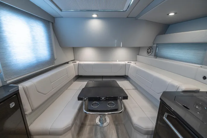 Slide: The Image of Luxurious interior of 2019 Formula 430 Super Sport Crossover yacht with sleek seating and table. - 47