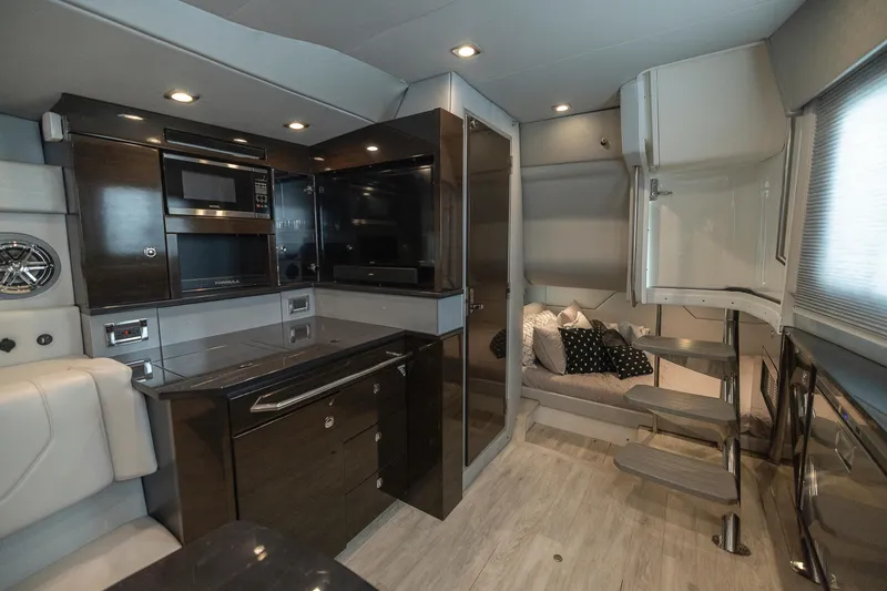 Slide: The Image of Luxurious interior of 2019 Formula 430 Super Sport Crossover with modern amenities and sleek design. - 49