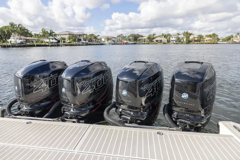 Slide: The Image of Four powerful outboard motors on a 2019 Formula 430 Super Sport Crossover boat. - 5