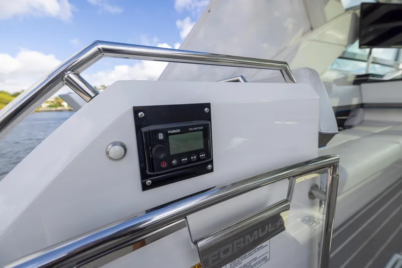 Slide: The Image of 2019 Formula 430 Super Sport Crossover boat interior with control panel. - 9