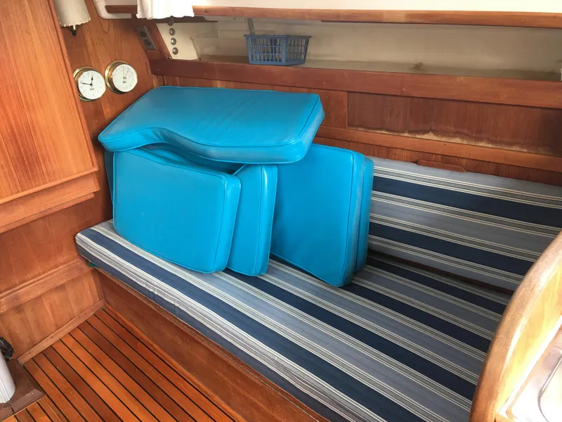 Slide: The Image of Interior of Sabre 34 MK II yacht, blue cushions, wood finish. - 12