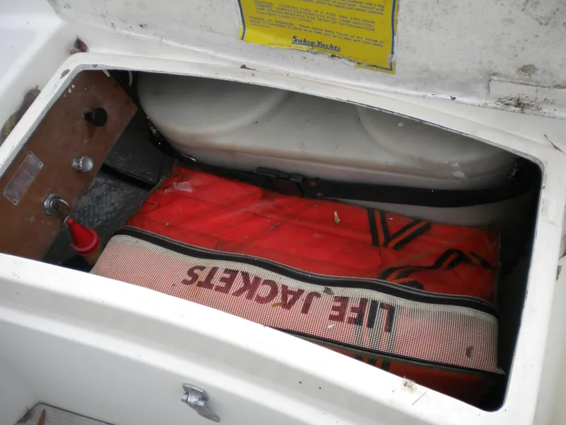 Slide: The Image of Storage compartment in Sabre 34 MK II boat with life jackets, 1980. - 27