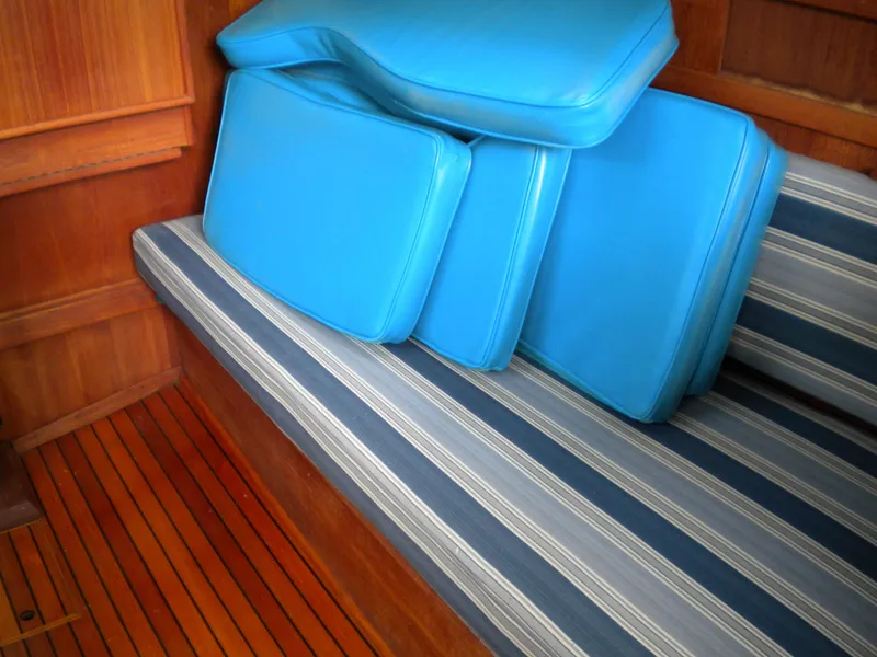 Slide: The Image of Blue cushions on striped bench in Sabre 34 MK II, 1980. - 37