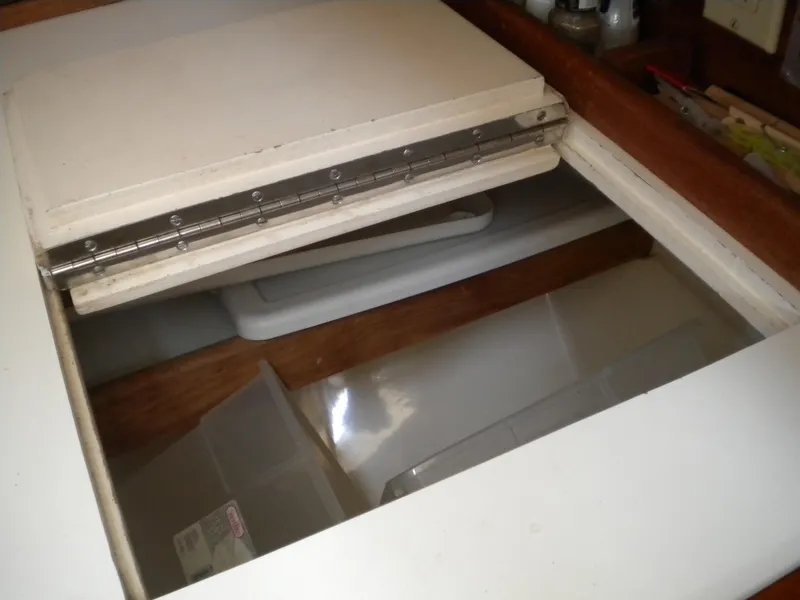 Slide: The Image of Interior of 1980 Sabre 34 MK II, open storage compartment lid. - 40