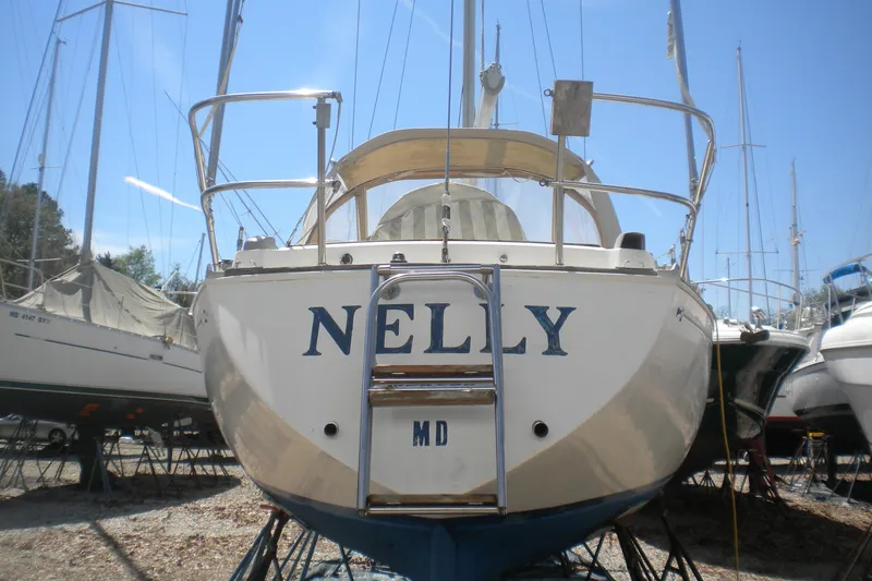 Slide: The Image of 1980 Sabre 34 sailboat named "Nelly" on dry dock, sunny day. - 55