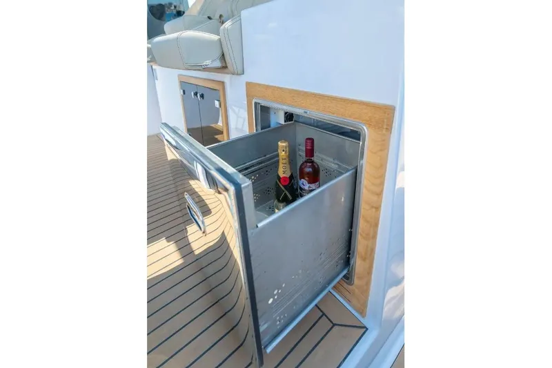 Slide: The Image of Open drawer with drinks on Tesoro 40 yacht, 2026 model. - 16