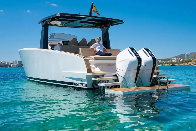 Slide: The Image of Tesoro 40 Yacht 2026 on clear water with engines. - 8