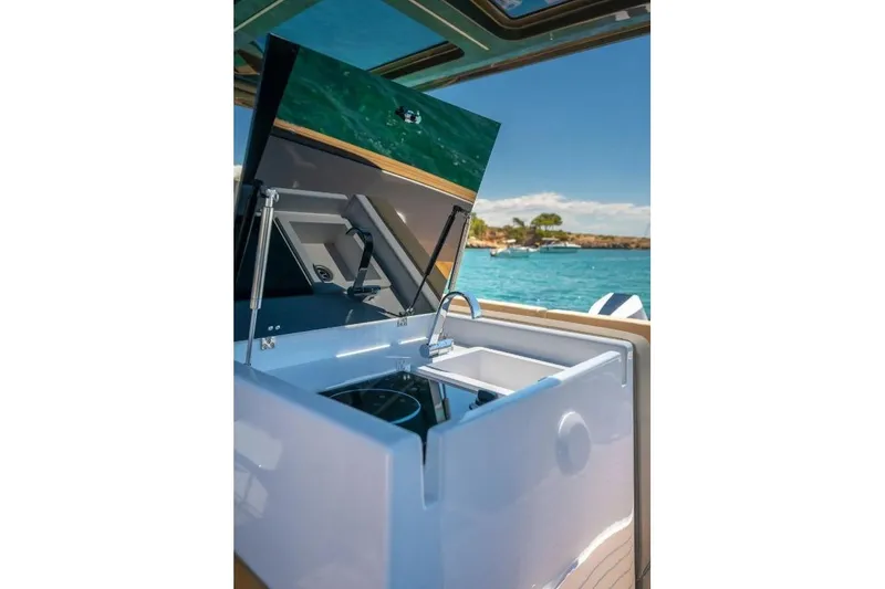 Slide: The Image of Tesoro 40 boat kitchen with open deck, 2026 model. - 14