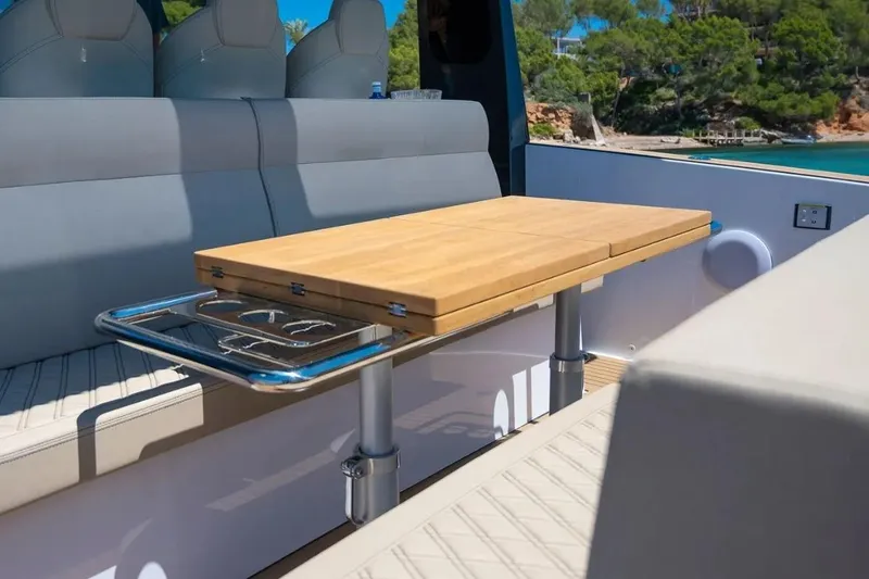 Slide: The Image of Interior of Tesoro 40 boat with wooden table, 2026 model. - 15