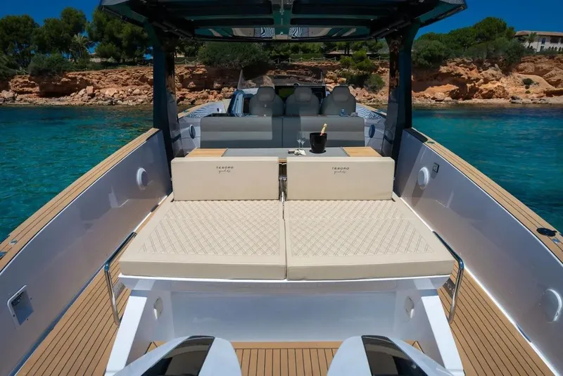 Slide: The Image of Luxurious Tesoro 40 boat, 2026 model, on clear water. - 19