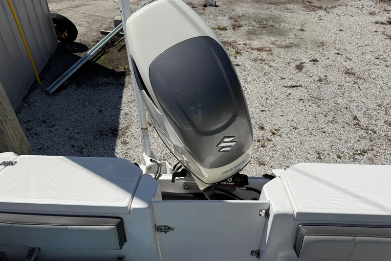 Slide: The Image of 2022 Aquasport 2300 Center Console with Suzuki outboard motor, viewed from above. - 3