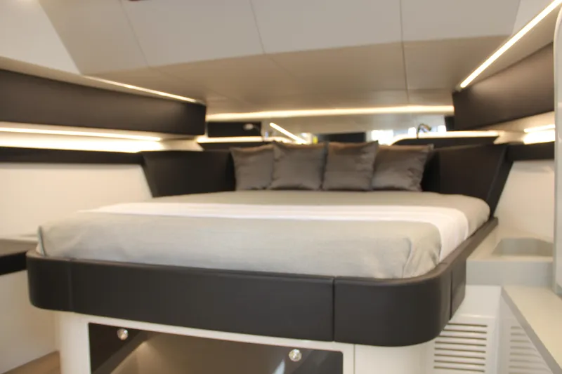 Slide: The Image of Luxurious interior cabin of 2023 Canados 493 Gladiator yacht with modern bedding. - 13