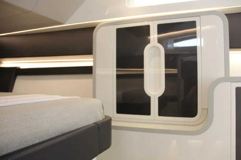 Slide: The Image of Interior of 2023 Canados 493 Gladiator yacht, featuring modern design and sleek cabinetry. - 14