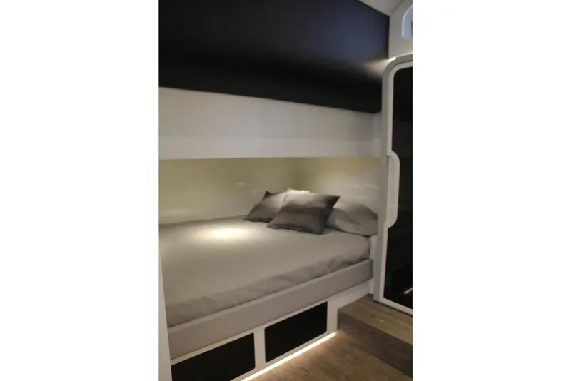 Slide: The Image of Luxurious cabin interior of 2023 Canados 493 Gladiator yacht with cozy bedding. - 18