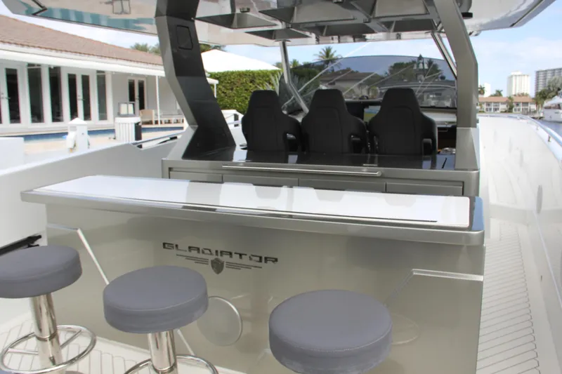 Slide: The Image of 2023 Canados 493 Gladiator yacht interior with sleek seating and modern design. - 6