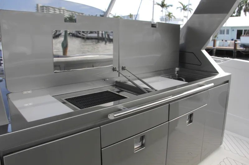 Slide: The Image of Outdoor kitchen on 2023 Canados 493 Gladiator yacht with sleek design and modern amenities. - 7